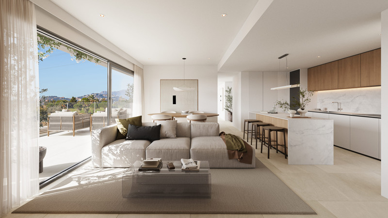 Altos del Chaparral – Mijas Costa - open-plan living room and kitchen with marble island, terrace and mountain views