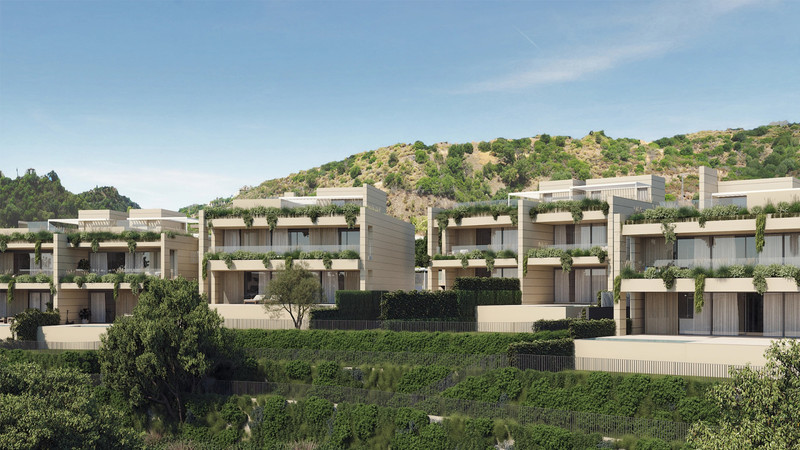 Sira Homes – Elviria - luxury new-build villas with green terraces set against a pine-covered hillside in Elviria, Málaga