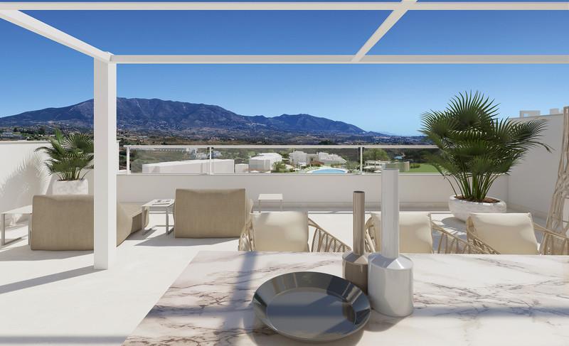 SOLANA VILLAGE – La Cala Golf - rooftop terrace with marble dining table, lounge seating, palm trees and panoramic mountain views