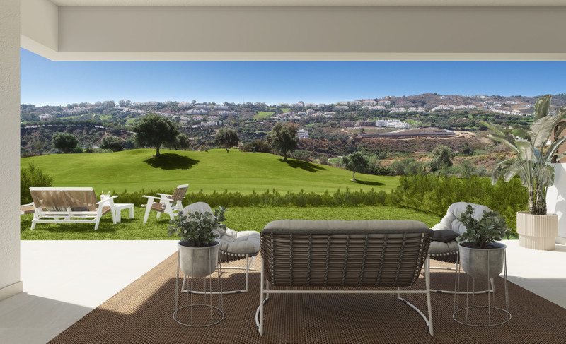 The Meadows – La Cala Golf - shaded terrace with outdoor sofa overlooking lush golf course and hillside views