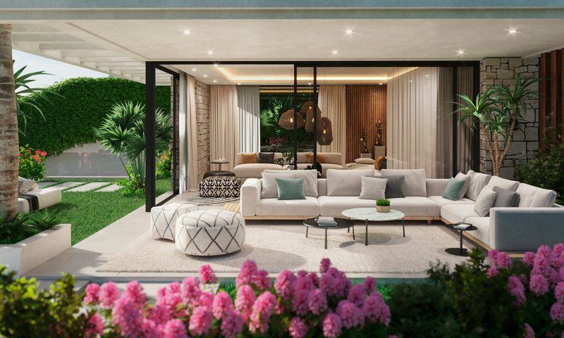 7 Diamonds Villas – La Capellania - åpen innendørs-utendørs stue med stor sofa, poufer og frodig hageterrasse