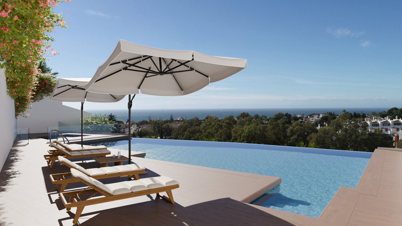 Aalto Residences – Riviera del Sol - infinitybasseng med solstoler og panoramautsikt over havet