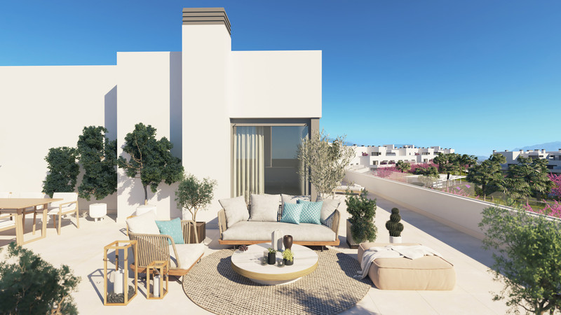 Acqua Gardens – Estepona - takterrasse med loungemøbler, oliventrær og utsikt over boligområdet