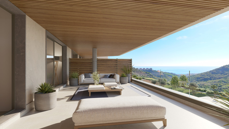 Atria – Phase 2 – La Alcaidesa - covered terrace with outdoor lounge seating and panoramic sea and hillside views