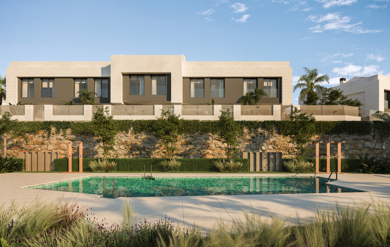 Benjamin's Dream – Calahonda - modern townhouse exterior with communal pool, stone retaining wall and landscaped gardens