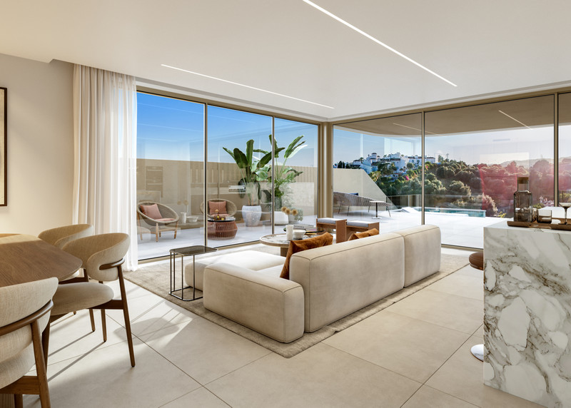 Beyond Homes – Estepona - lys åpen stue med gulv-til-tak-glass, terrasse og bassengvisning