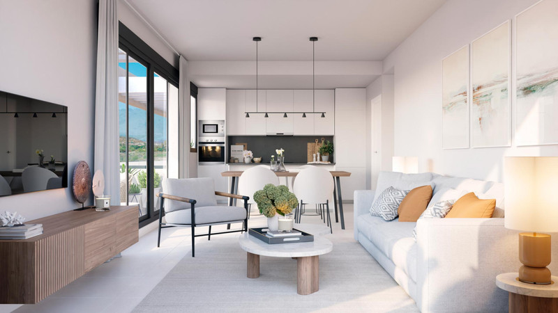 Bliss Homes – Casares - lyst og åpent stue- og kjøkkenlandskap med store terrassedører