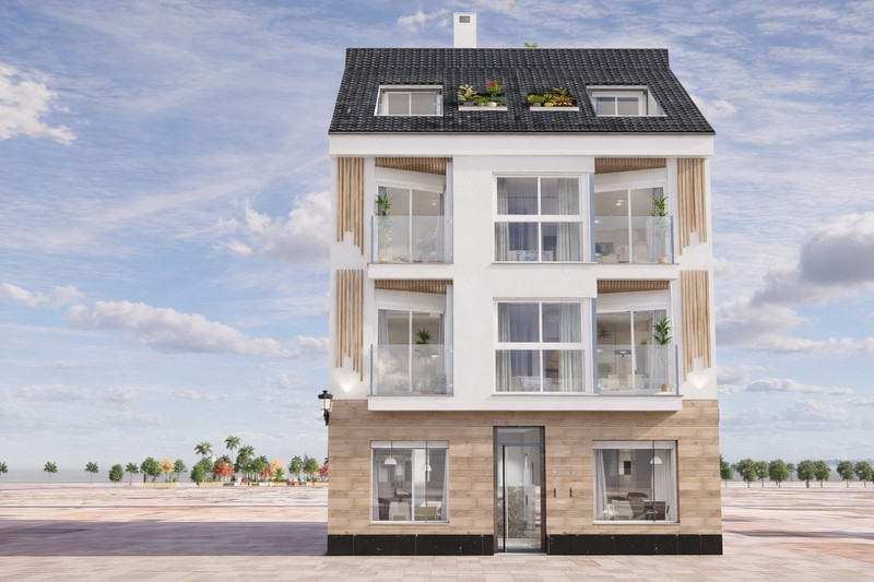 Edificio Lúxor – Fuengirola - moderne fireetasjers nybyggfasade med balkonger, steinkledning og mansardtak