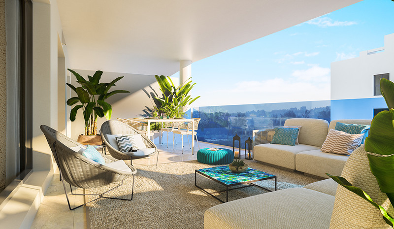 Jardines de Las Lagunas Fase II – Las Lagunas - solrik terrasse med loungemøbler, kurvmøbler, tropiske planter og sjøutsikt