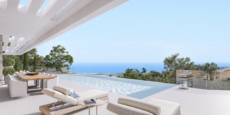 La Reserva de la Cala Golf – La Cala Golf - infinitybasseng med havutsikt og utendørs loungeområde