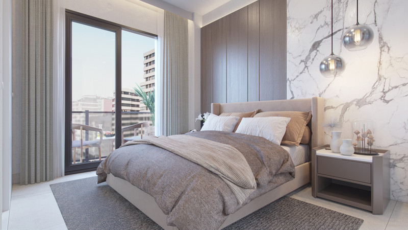 Malaga Centrum – Málaga Centro - luxury bedroom with marble feature wall, pendant lights and city views