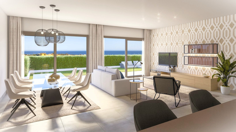 Marine Hills – Stage 2 – Estepona - lyst åpent stue- og spisekjøkken med store vinduer og terrasse mot havet