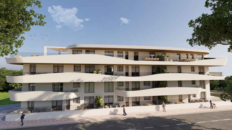 Green Mountain 1 – Estepona - eksteriørfasade av moderne luksusleilighetsbygg med buede hvite balkonger og takterrasse