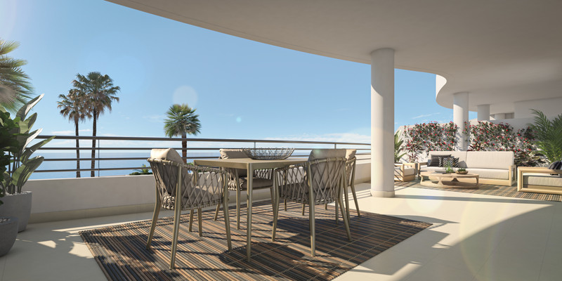 Nexus Residences – Benalmadena – luksuriøs terrasse med spisemøbler, loungeområde og panoramautsikt over havet