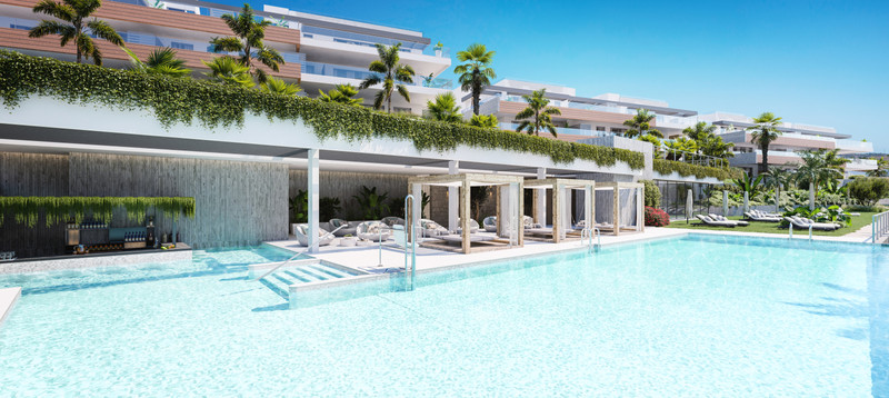 Quintessence – Altos de los Monteros - luxury outdoor swimming pool with sun loungers, pergolas and lush tropical landscaping