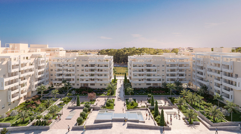 Residencial Albatros XV – Marbella - luftperspektiv av frodig indre gårdsplass med fontene, palmetrær og hvite leilighetsbygg