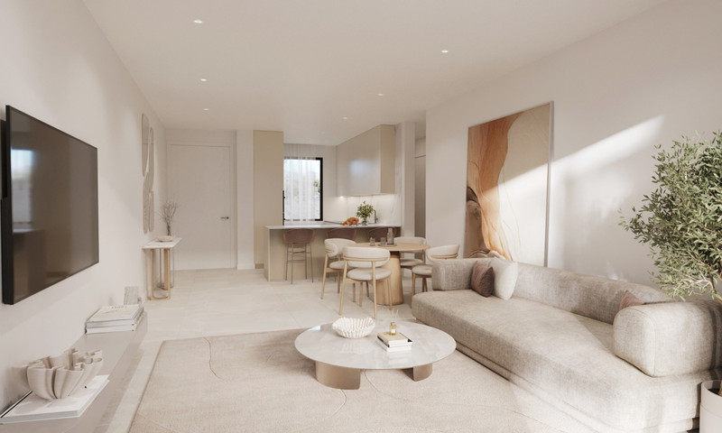 Sunway Residence – Estepona - lys åpen stue og spiseplass med nøytrale toner og moderne kjøkken