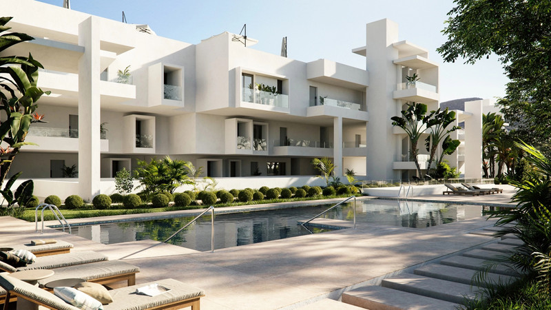 The Place Alcazaba – Casares - moderne hvit fasade med felles basseng, solstoler og velstelte hager
