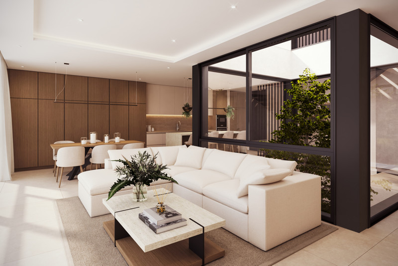 Villa Ainoa – La Cala Golf - åpen stue med kremfarget sofa, marmorbord, spiseområde og gulv-til-tak-vinduer mot hage