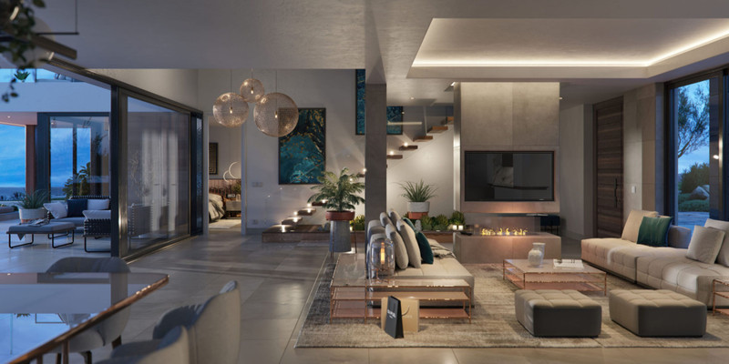 VILLA AZAHAR Europa Golf – La Cala Golf - åpen stue med peis, pendellamper og gulv-til-tak glassdører