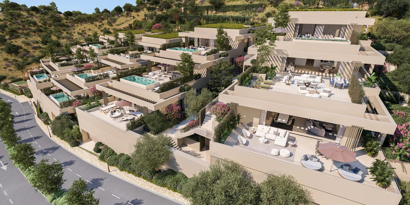 Finca de Jasmine Sky Villas – Benahavís - aerial view of terraced luxury villas with private pools, rooftop terraces, and landscaped gardens on a hillside