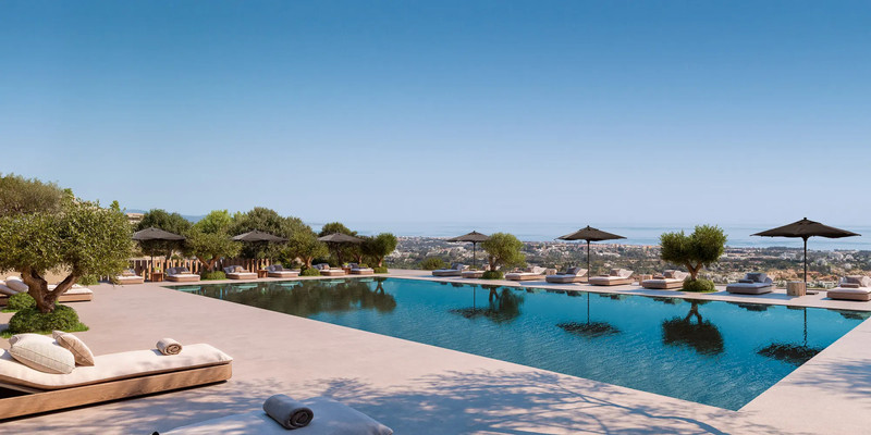 Finca de Jasmine Sky Villas – Benahavís - infinity pool terrace with panoramic sea views, sun loungers and olive trees