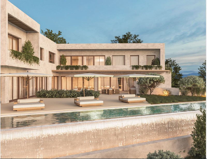 HL SG122 – Alhaurín el Grande - luxury new-build villa exterior with infinity pool, sun loungers and illuminated terraces at dusk