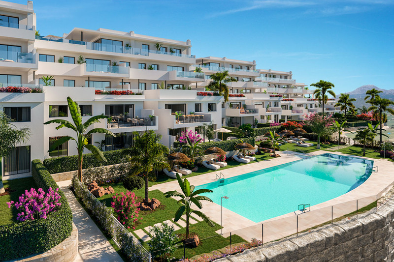 Las Terrazas de Cortesin Bon Air – Casares - luxury white apartment complex with tropical gardens and turquoise swimming pool
