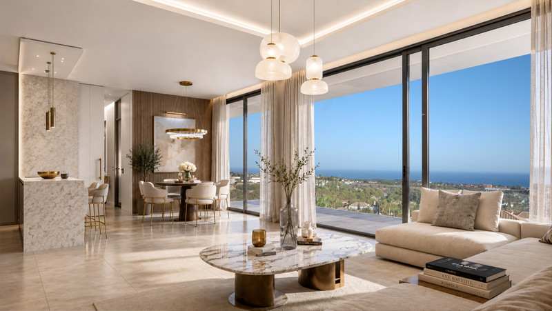 VILLA EVANIA Los Flamingos – Benahavís - open-plan living and dining room with marble coffee table, pendant lighting, and panoramic sea views through floor-to-ceiling glass doors