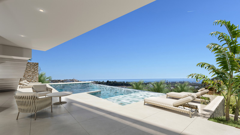 VILLA EVANIA Cortesín – Casares - infinity pool terrace with sea views, sun loungers and tropical landscaping