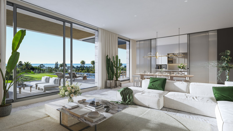 Ocean 11 – Bel Air - open-plan living room with floor-to-ceiling glazing, white sofas, and sea views beyond the pool terrace