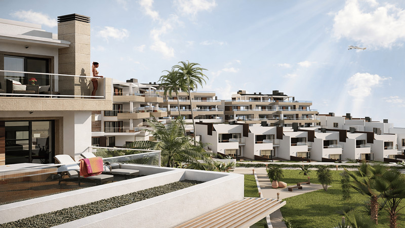 Paraiso Beach – Apartments – La Línea - modern white residential complex with terraces, palm trees and landscaped gardens