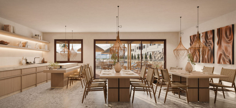 Savia – Fase 1 – Mijas - open-plan dining and kitchen area with rattan pendant lights and terrace access