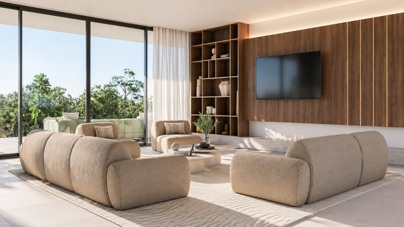 Stupa – Villa Prana – Benahavís - modern living room with curved sofas, wood-panelled TV wall and floor-to-ceiling glazing overlooking lush greenery