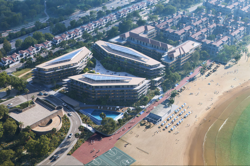 Vesta Mare – La Duquesa - aerial view of beachfront luxury development with solar rooftops, pool, and sandy beach on the Costa del Sol