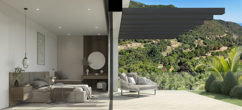Villa Alhama – Benahavís - luxury bedroom opening onto a shaded terrace with lush mountain views and outdoor lounge seating