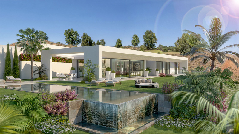 Villa Celestia – La Cala Golf - modern luxury villa exterior with infinity pool, waterfall feature and lush tropical gardens
