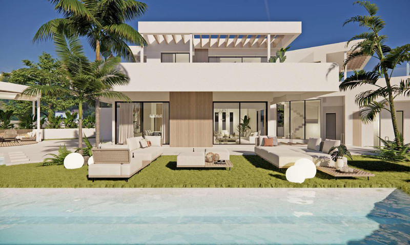 Villa Flores 11 – Rancho Santa Mónica – Benalmadena - modern white villa exterior with pool, garden seating and palm trees