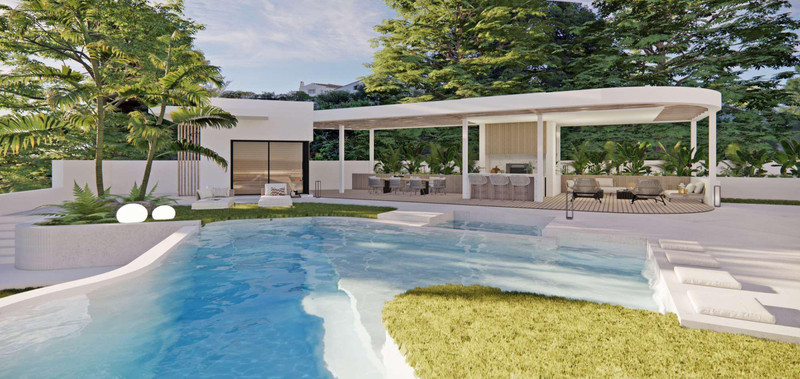 Villa Flores 11 – Rancho Santa Mónica – Benalmadena - outdoor pool, covered terrace with dining and lounge area surrounded by lush greenery