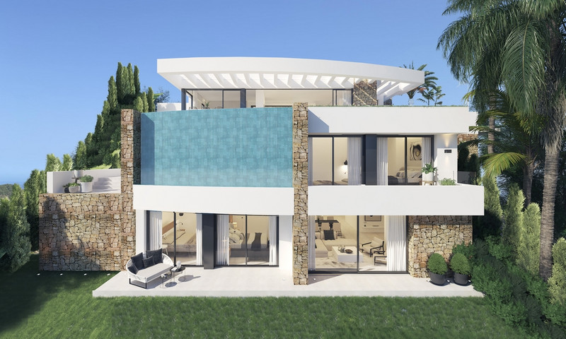 Villa La Ermita – Mijas - modern luxury villa exterior with stone facade, infinity pool, and rooftop terrace surrounded by lush gardens