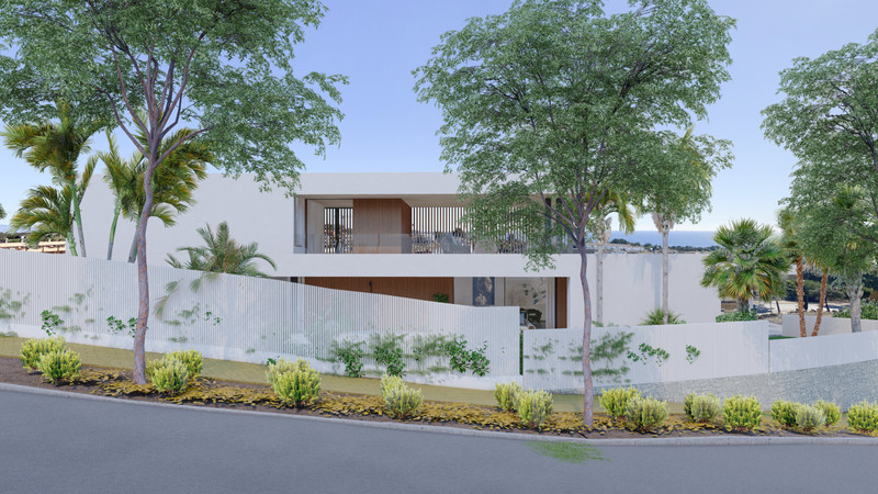 Villa Natalie – Manilva - modern white exterior facade with landscaped garden, terraces and sea views beyond