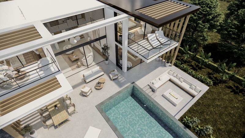 Villa Serenity – Benalmadena - aerial view of outdoor pool, terrace seating areas and open-plan interior with glass facades